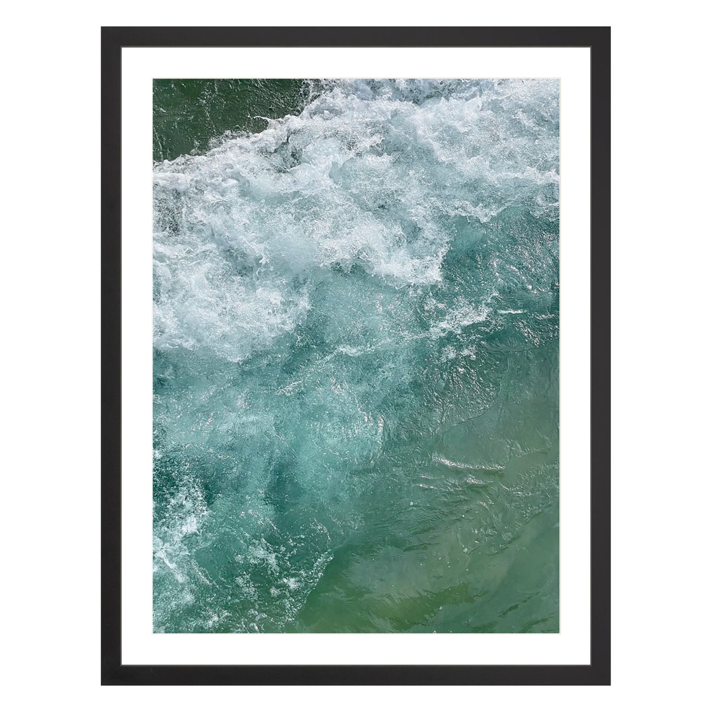 Photograph of ocean waves in Carmel California framed in black with white mat