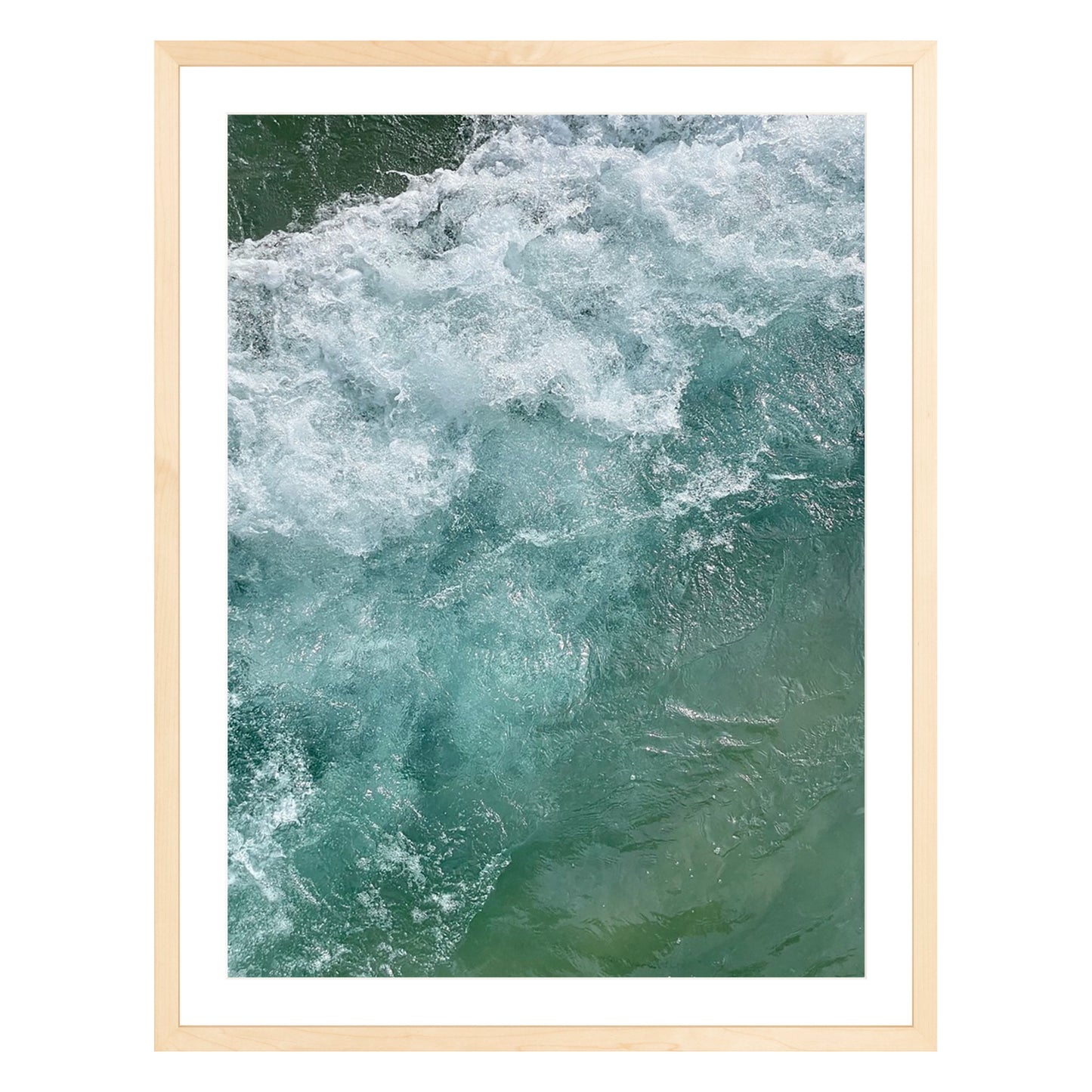 Photograph of ocean waves in Carmel California framed in natural wood with white mat