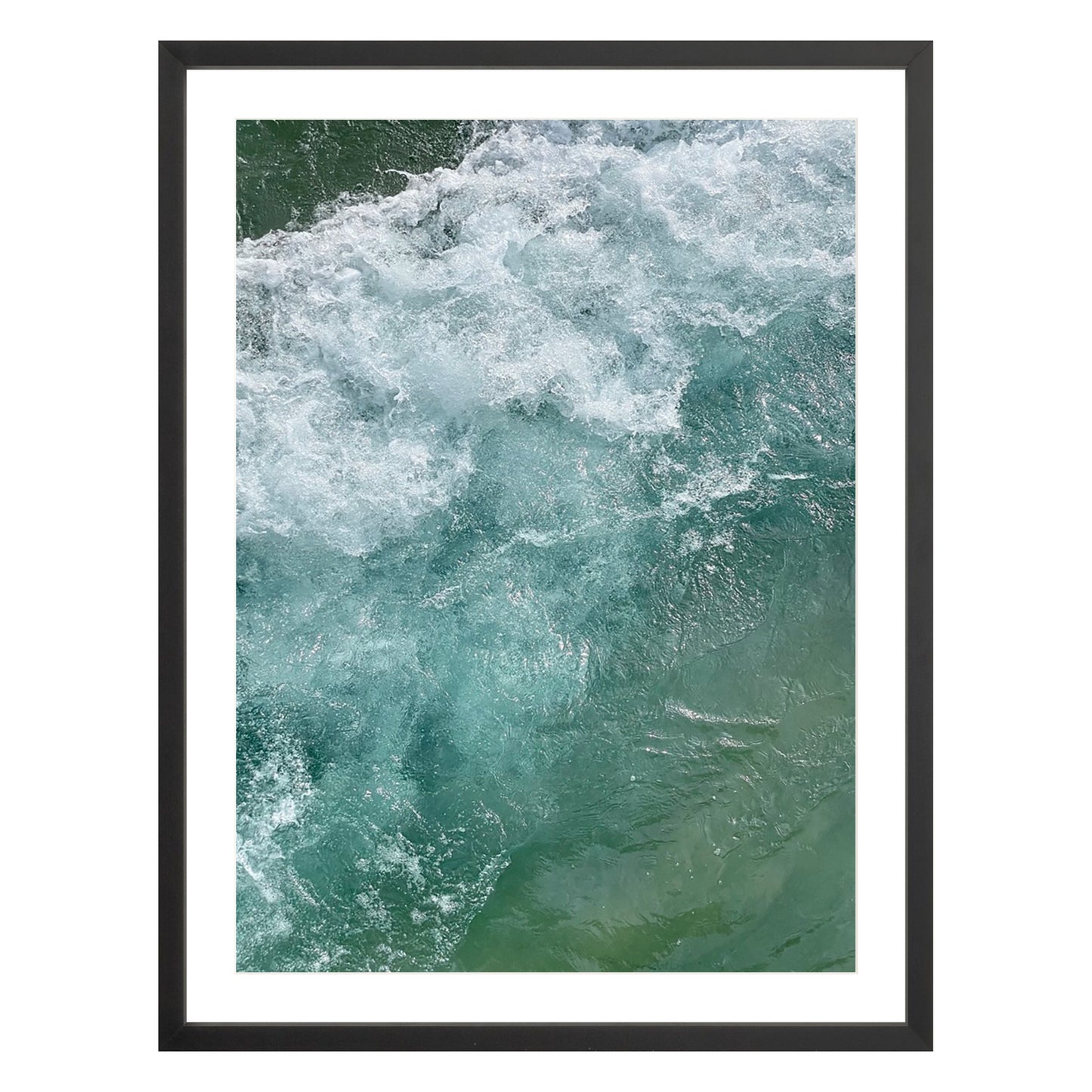 Photograph of ocean waves in Carmel California framed in black with white mat