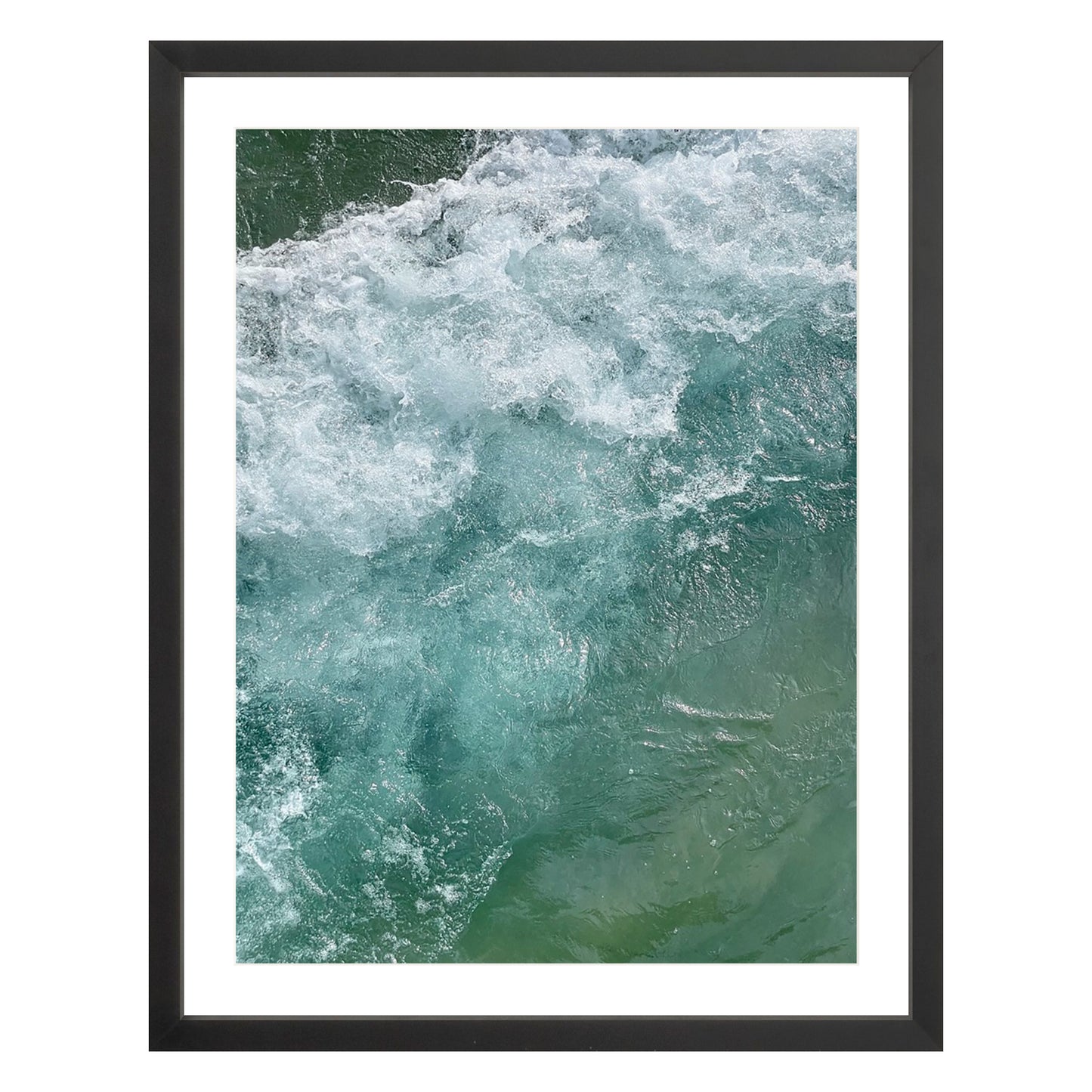 Photograph of ocean waves in Carmel California framed in black with white mat