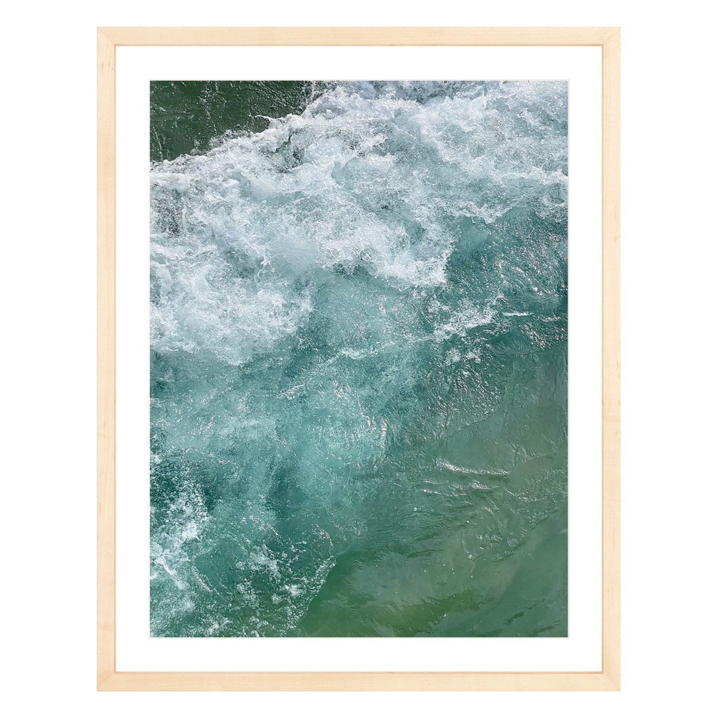 Photograph of ocean waves in Carmel California framed in natural wood with white mat