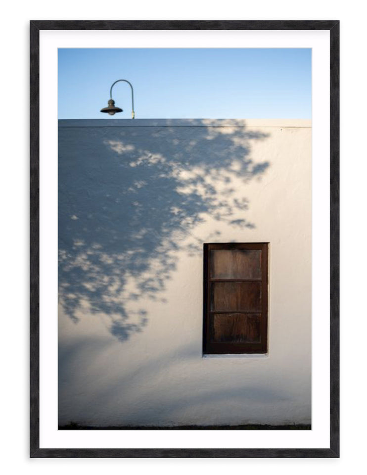 "Presidio Shadows" is a signature photographic print by Amanda Anderson. Taken in the Presidio neighborhood of San Francisco, it represents the perfect balance of light and shadow in an everyday scene that deserves it's own moment.
