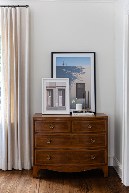 Amanda Anderson San Francisco Presidio and Double Doors framed prints on wooden dresser