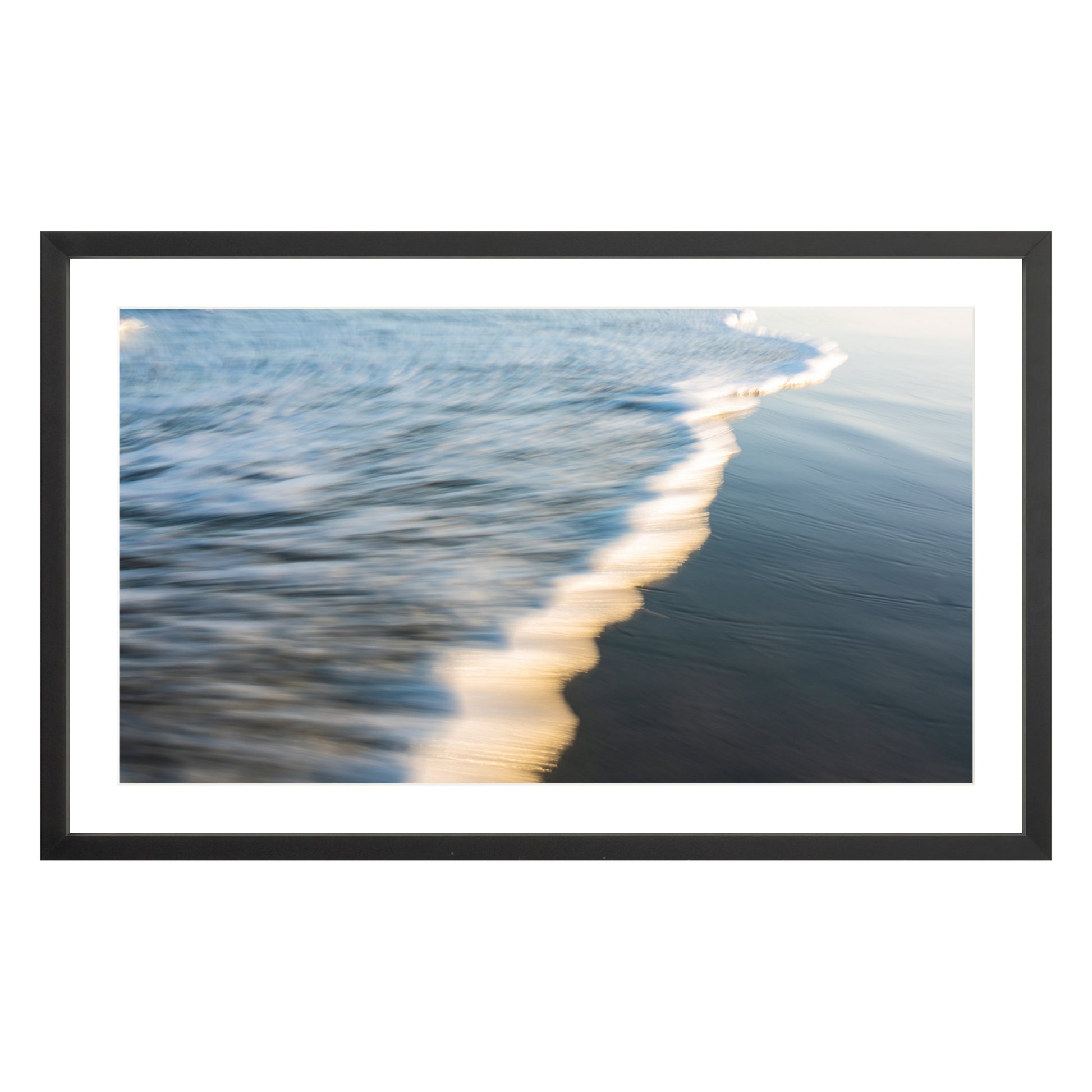 Photograph of wave at Atlantic Ocean framed in black with white mat