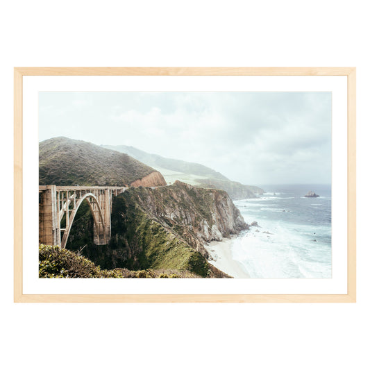 Photograph of Bixby Bridge in Big Sur California framed in natural wood with white mat