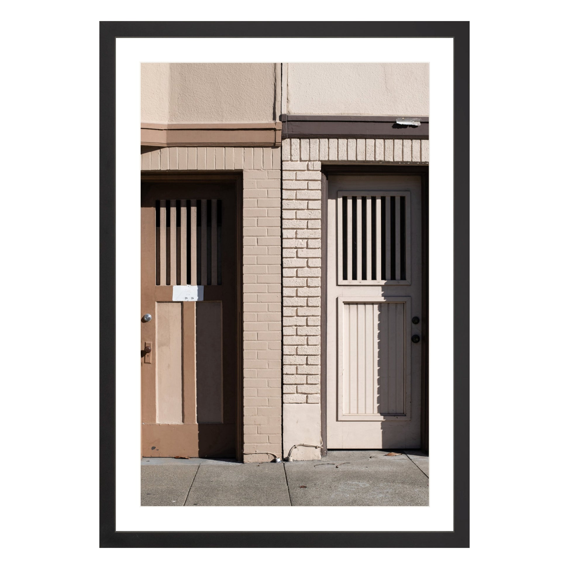 Photograph of two doors in San Francisco framed in black with white mat