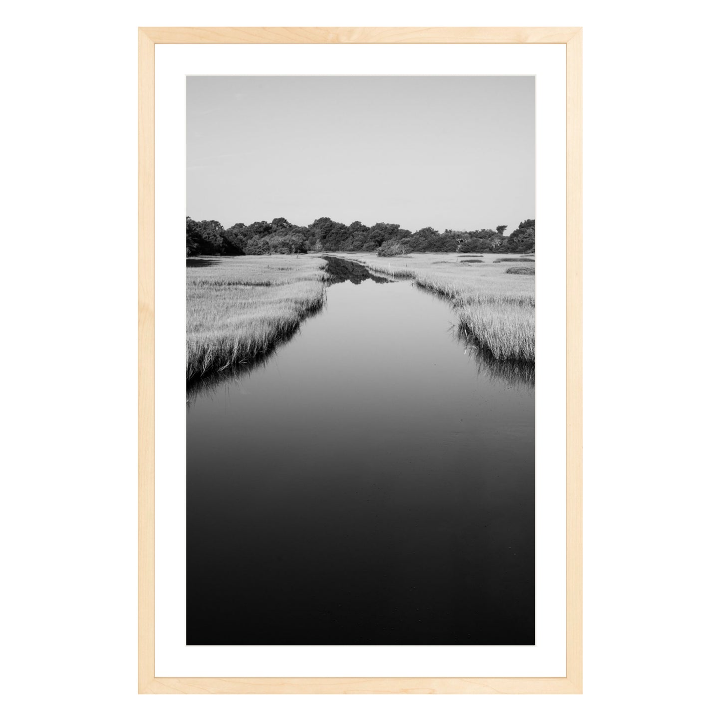 Black and white photograph of a marsh stream on Kiawah Island, South Carolina framed in natural wood with white mat