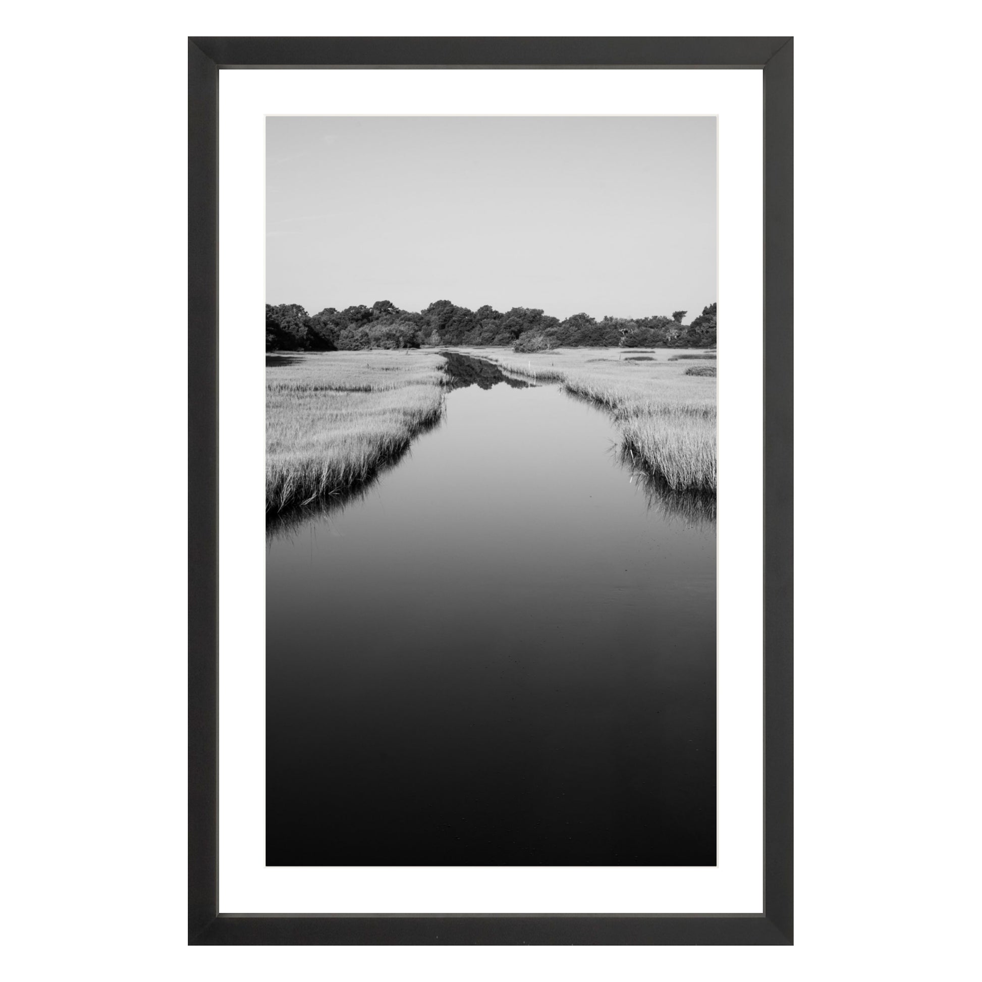 Black and white photograph of a marsh stream on Kiawah Island, South Carolina framed in black with white mat