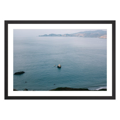 Photograph of San Francisco Bay in black frame with white mat