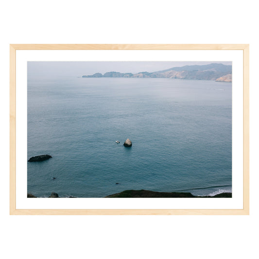 Photograph of San Francisco Bay in natural wood frame with white mat