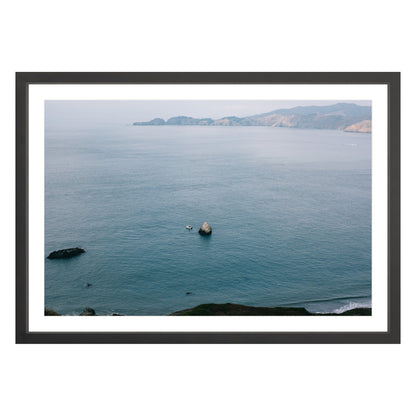 Photograph of San Francisco Bay in black frame with white mat