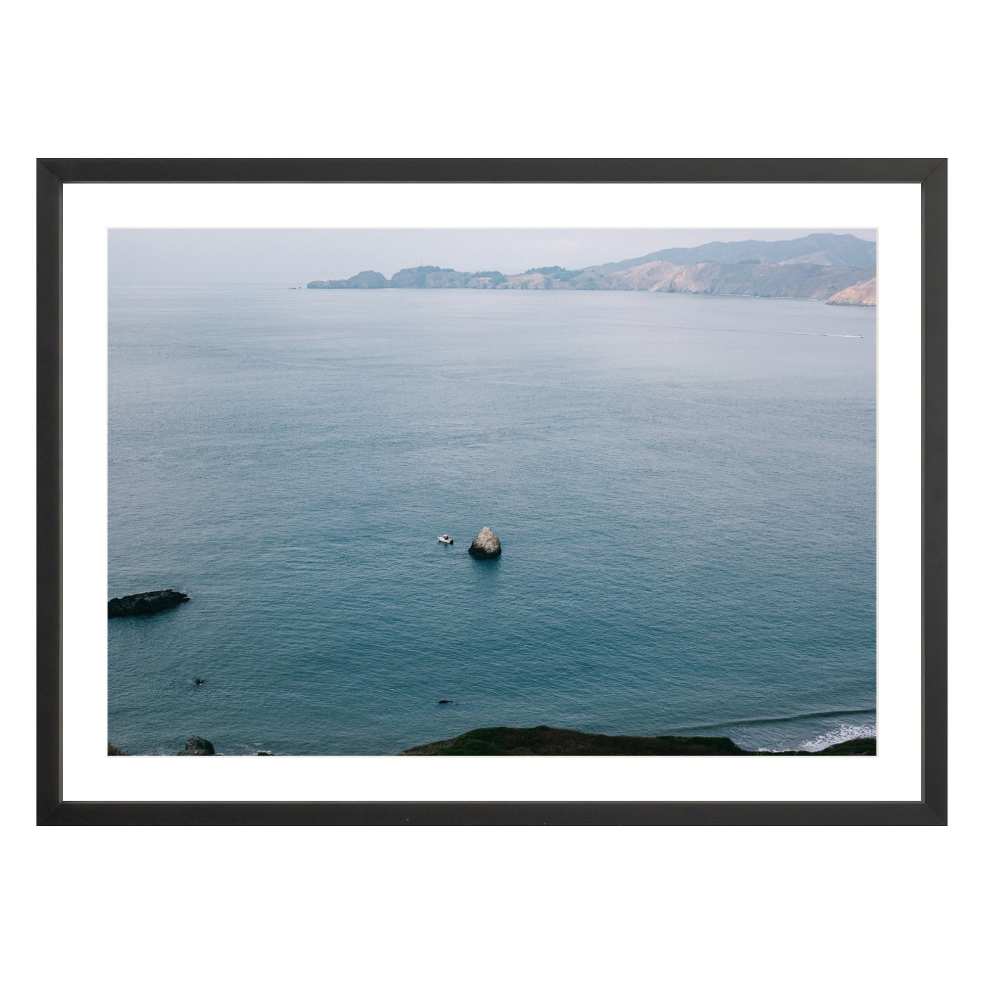 Photograph of San Francisco Bay in black frame with white mat