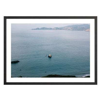 Photograph of San Francisco Bay in black frame with white mat