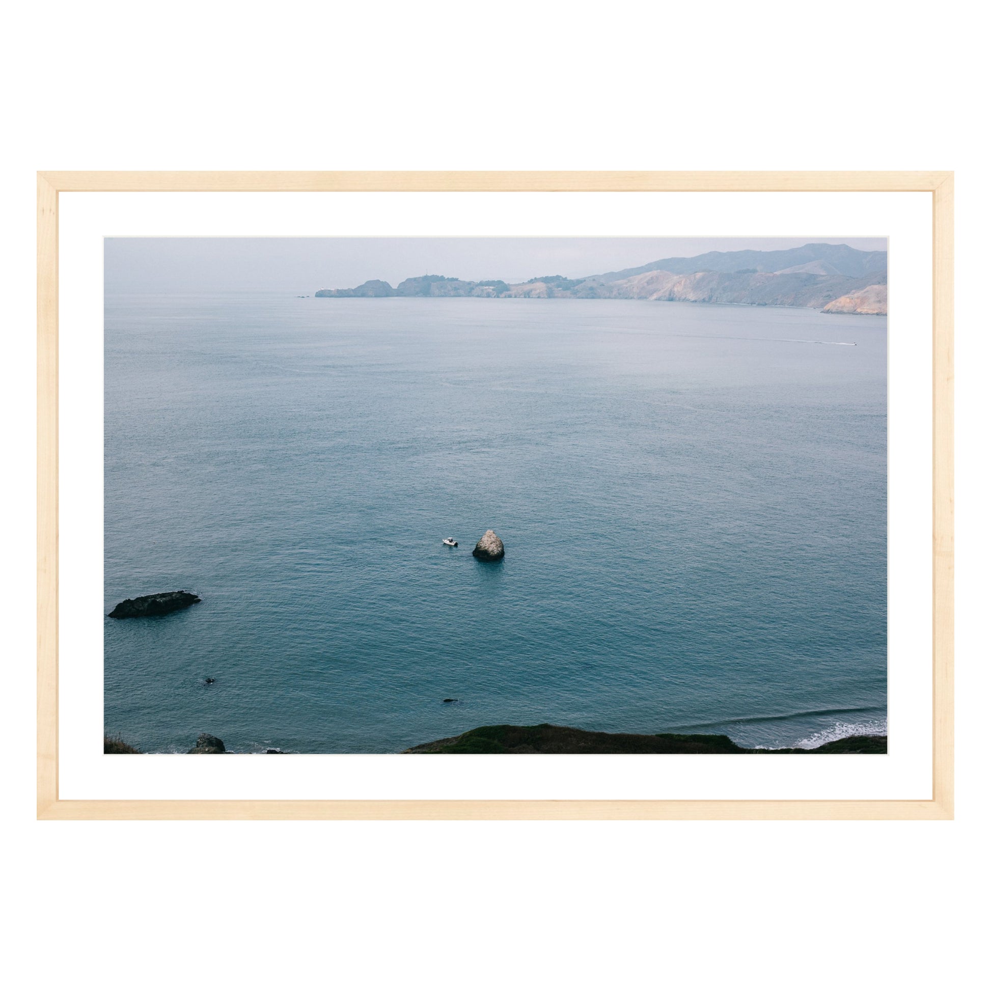 Photograph of San Francisco Bay in natural wood frame with white mat