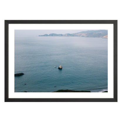 Photograph of San Francisco Bay in black frame with white mat