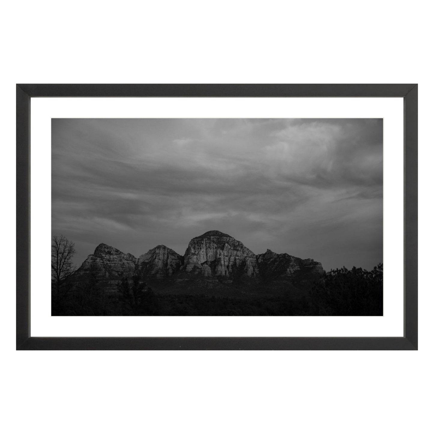 Black and white photograph of mountains in Sedona Arizona at night in a black frame with white mat