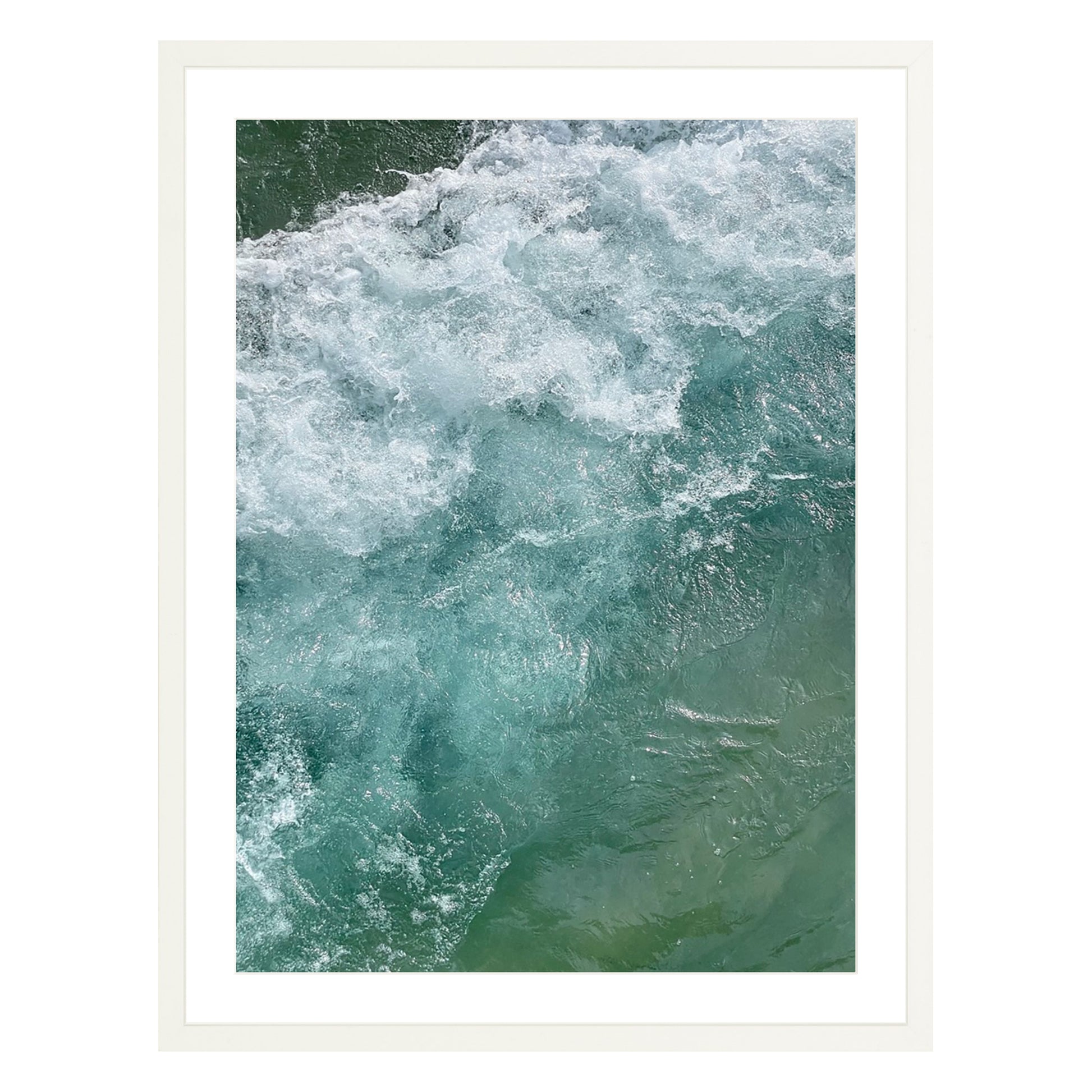Photograph of ocean waves in Carmel California framed in white with white mat