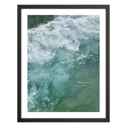 Photograph of ocean waves in Carmel California framed in black with white mat